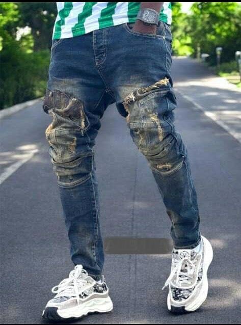 Jeans déchirés tendance homme