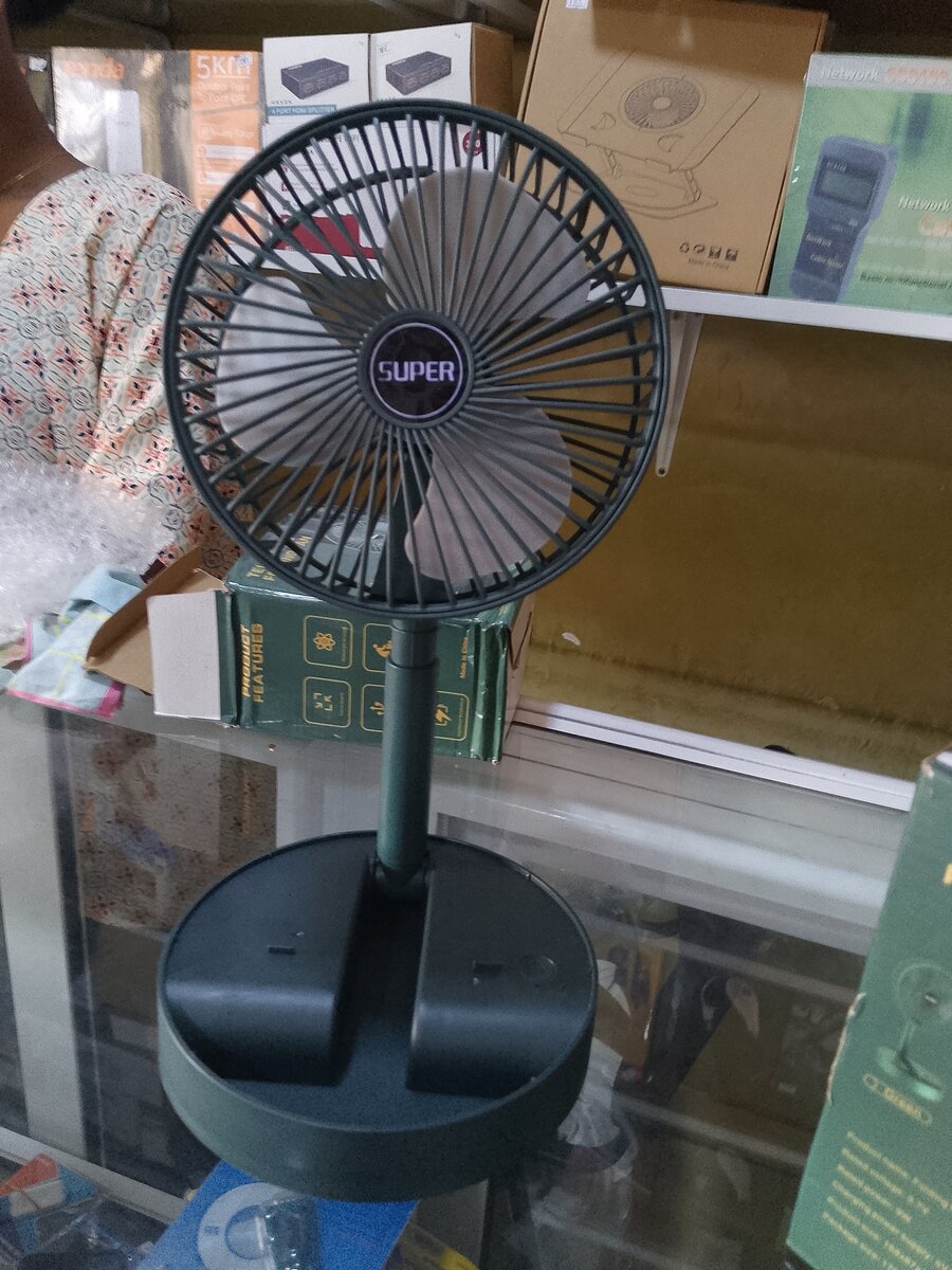 Telescope folding fan