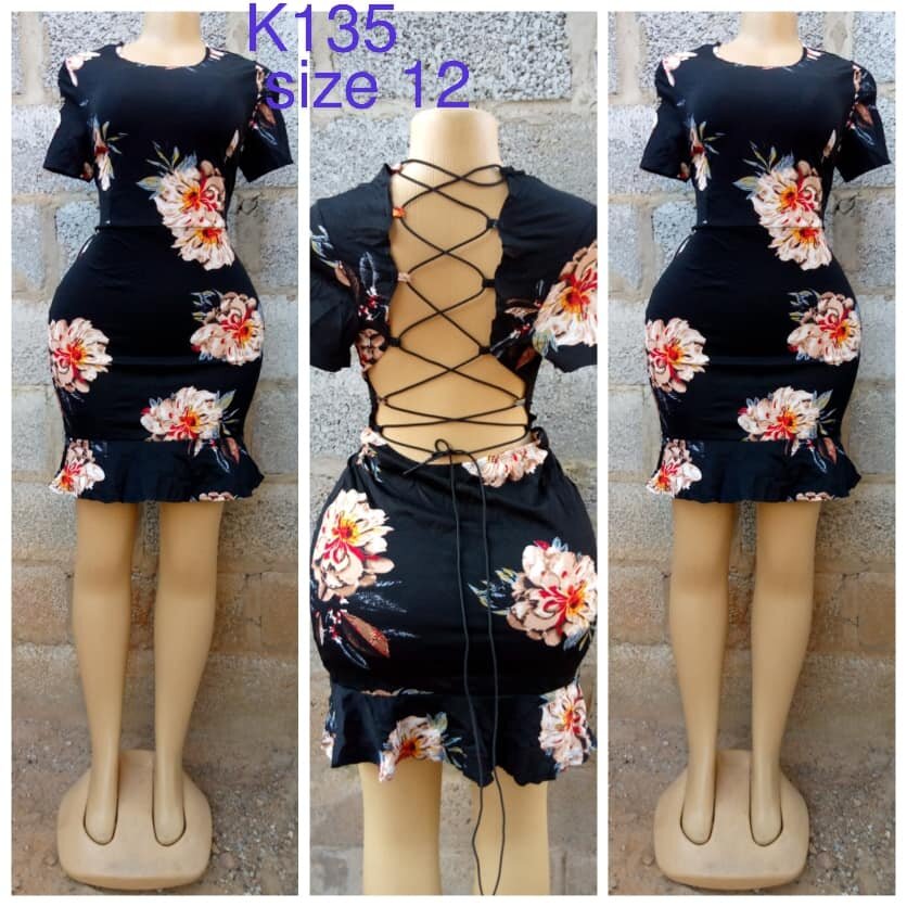 Black dress with print, lacing on the back, size 12