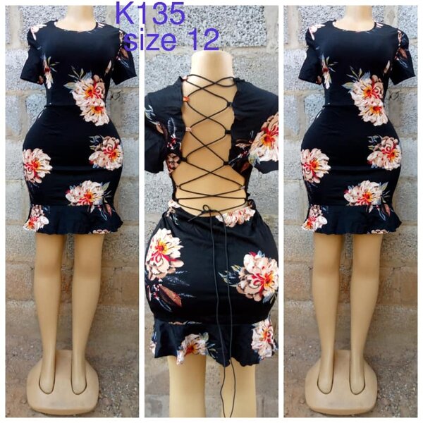 Black dress with print, lacing on the back, size 12