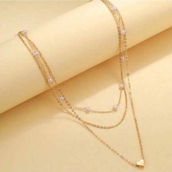 Collier superposé perles et cœur