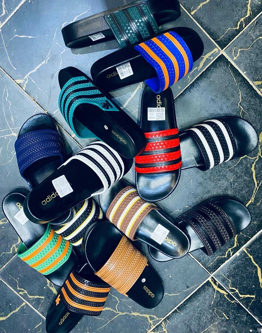 Adidas slides and Nike slides