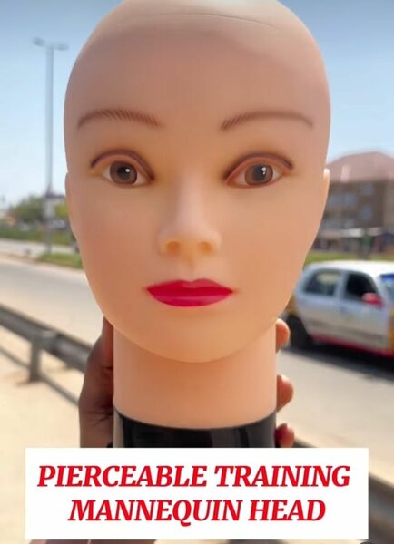 Pierceable training mannequin head