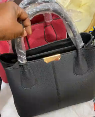 Women's bag with a square shape in black