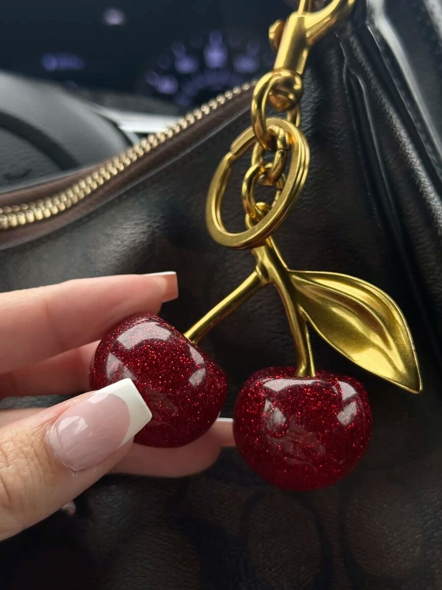 Porte-clés cerises Coach
