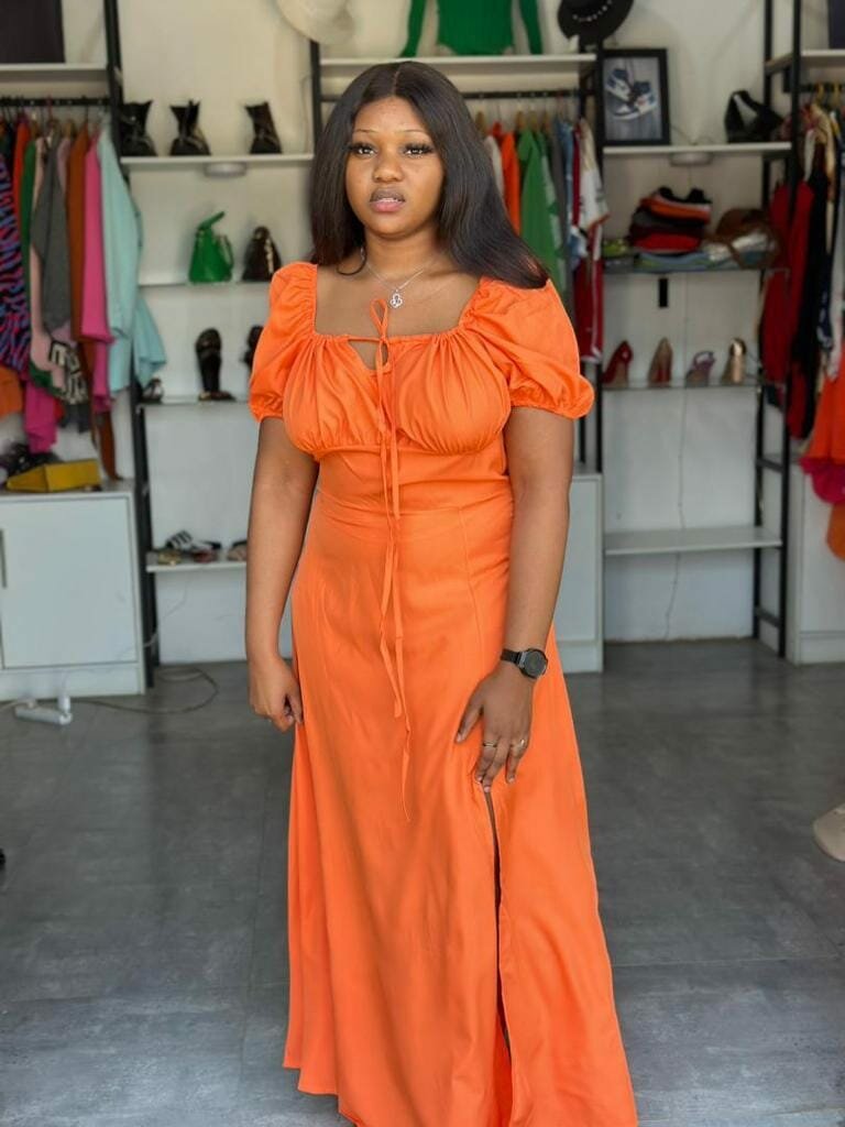 Women's summer dress, fitted, with a slit