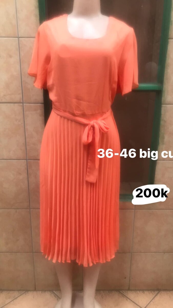 Peach-colored women's dress with short sleeves, sizes 36-46