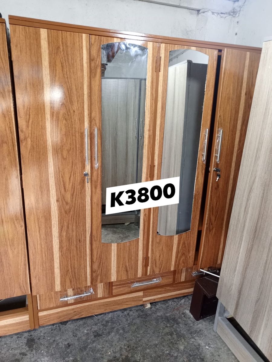 brown wardrobe with 2 mirrors