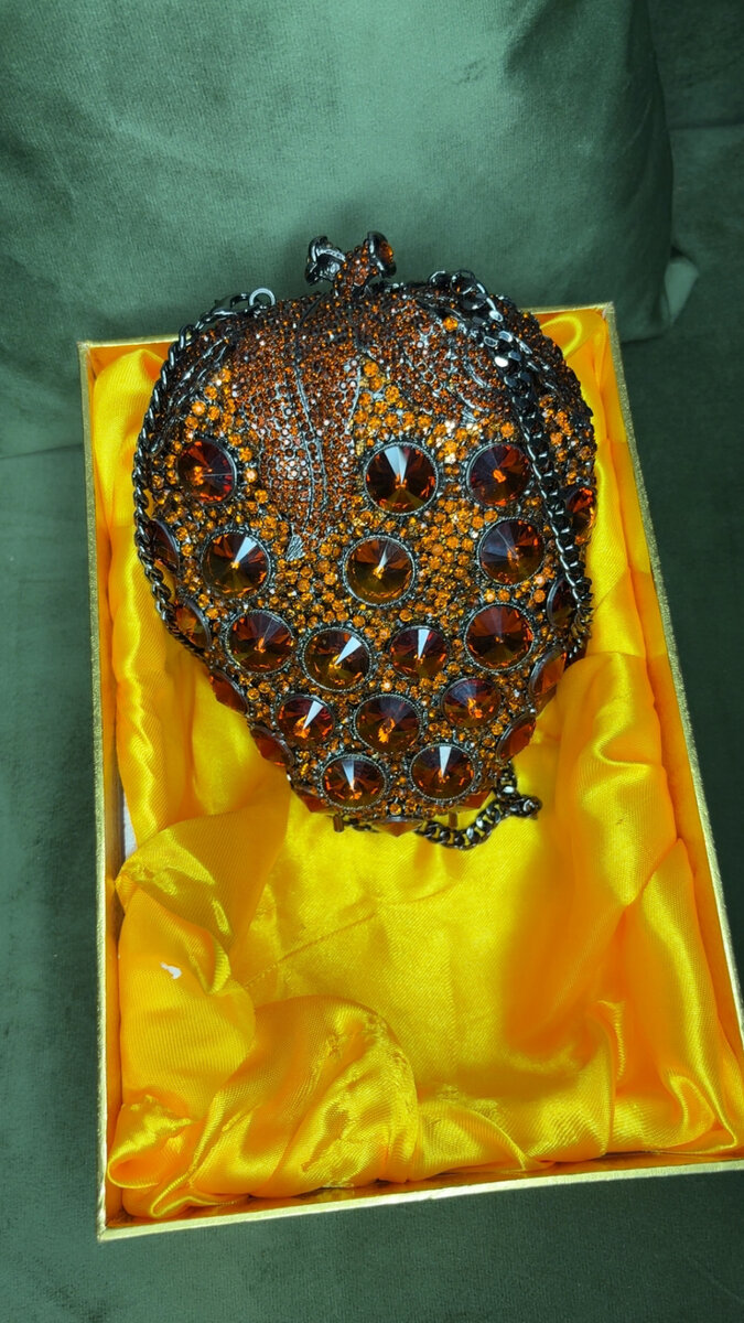 Pochette étoile strass élégante