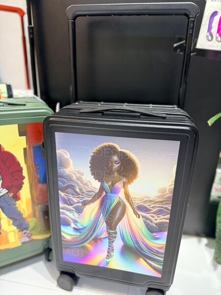 Valise à roulettes artistique