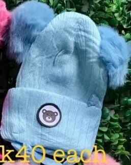 Hat with 2 pompoms and ties, blue