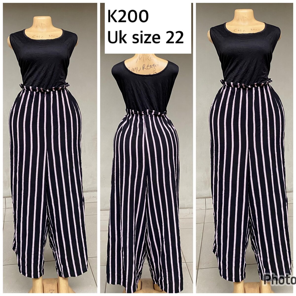 black top and striped pants