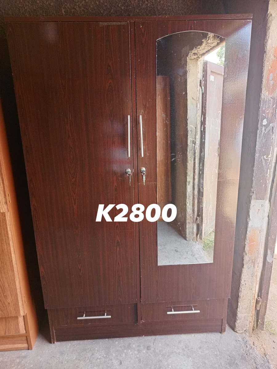 brown wardrobe with mirror