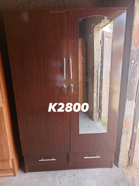brown wardrobe with mirror