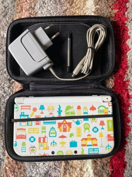 Nintendo New 3DS XL occasion quasi neuve+40 jeux installés