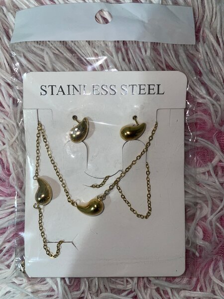 Parure acier croix moderne