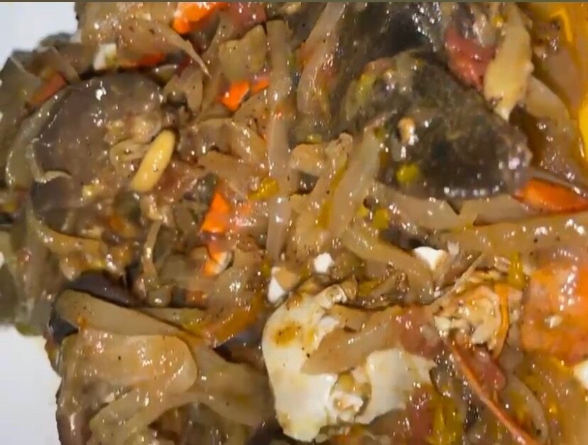 Sautée d´escargot et crabes