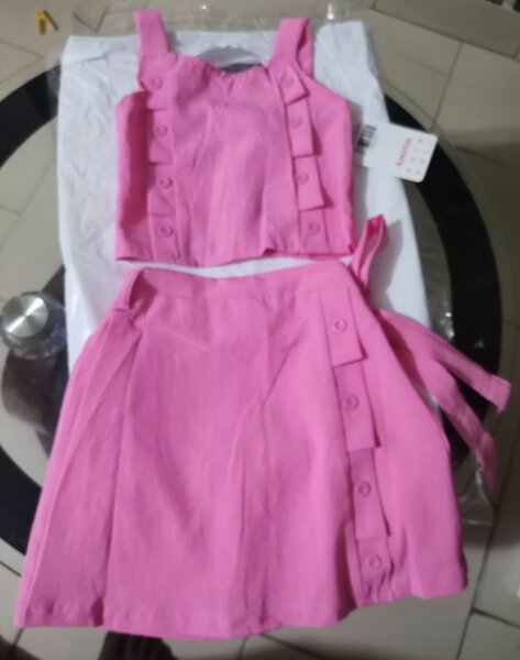 Ensemble top et jupe rose