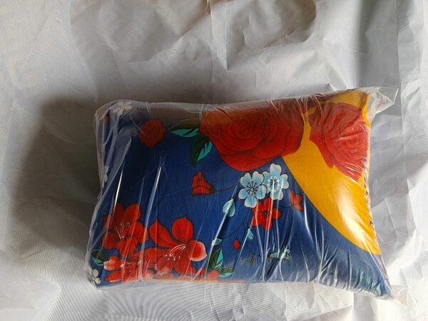 Oreiller fleuri coloré