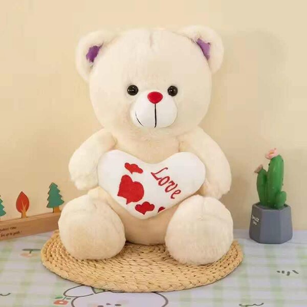 Nounours en peluche coeur