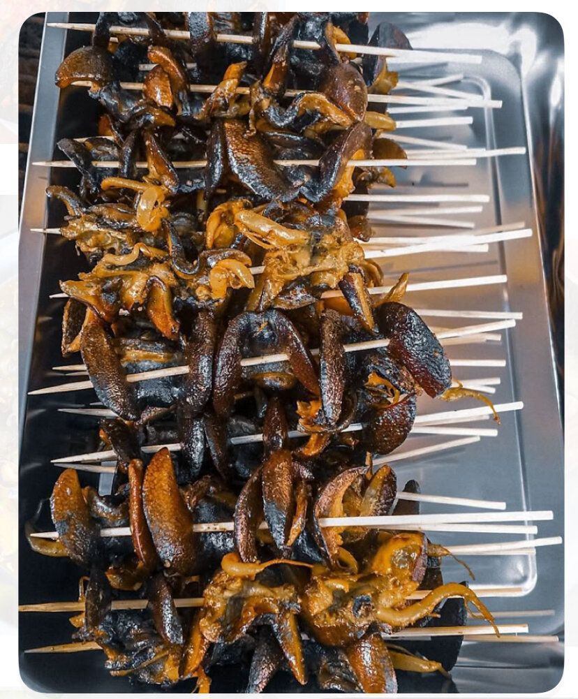 Escargots épicés marinés