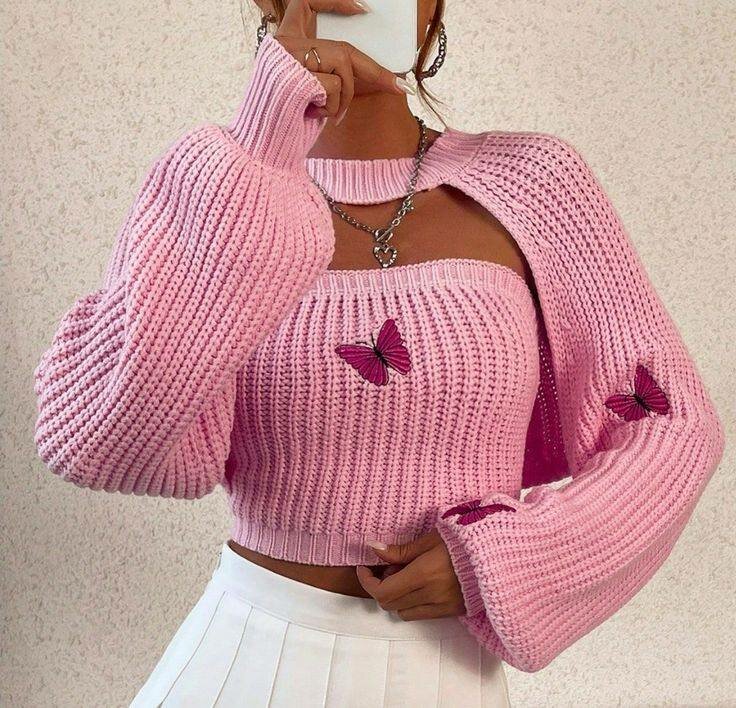 Pull rose papillon femme