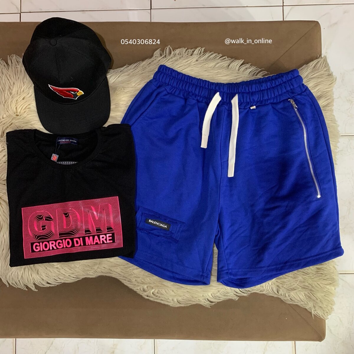 One T-shirt, one short sweatpant and a cap