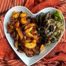 Escargot sauté avec alloco