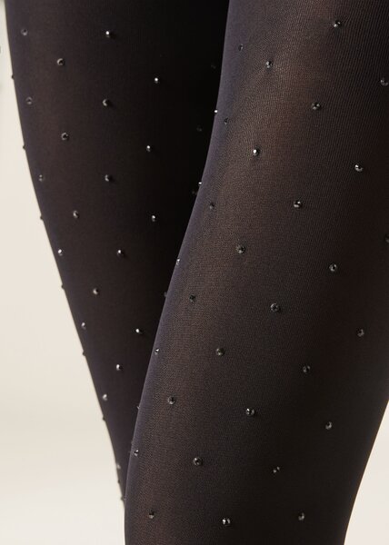 Collants noirs à pois scintillants