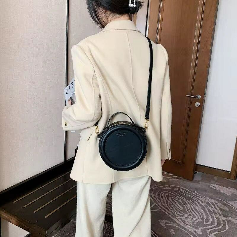 Sac rond en cuir élégant