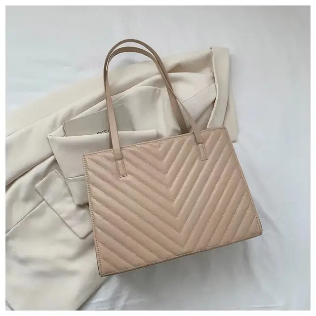 Sac à main beige matelassé