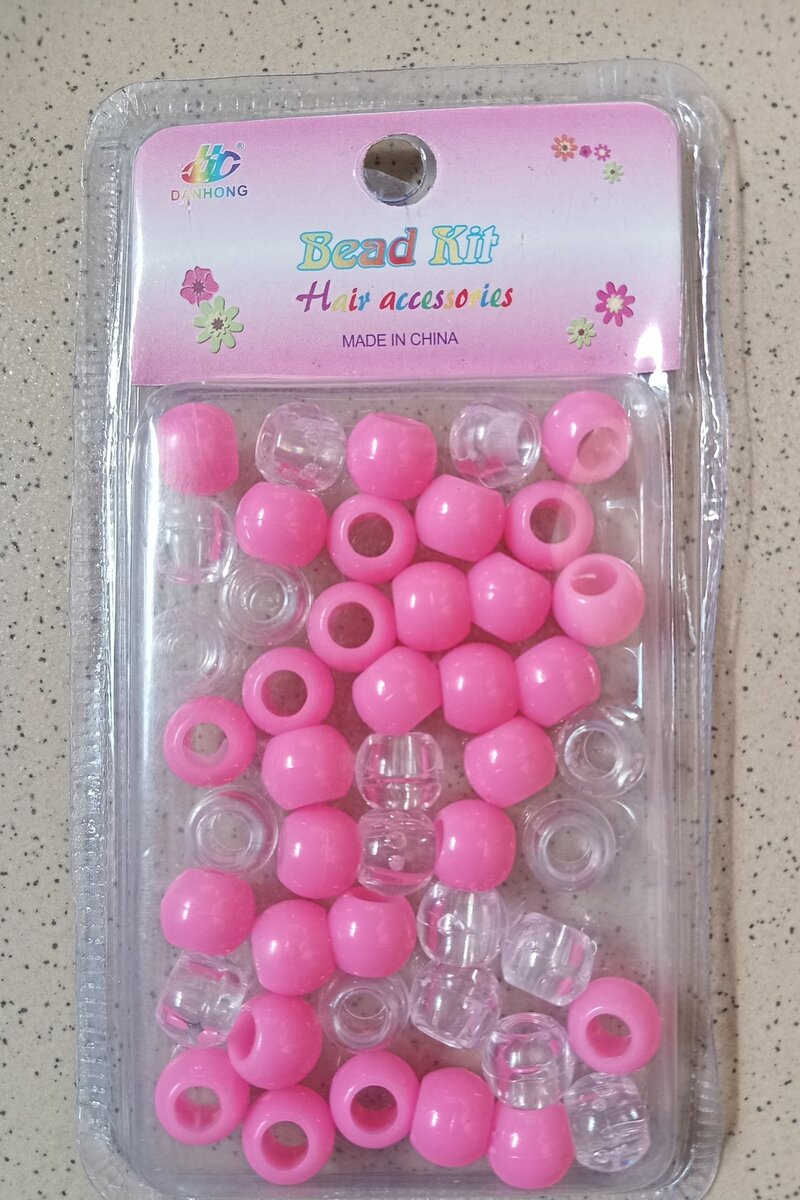 Hair beads for kids. Comes in pink and crystal shade.