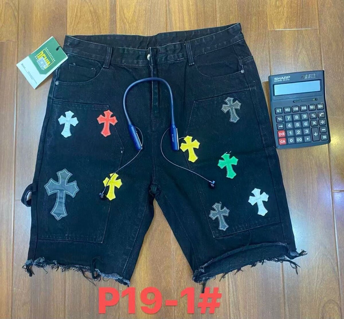 Shorts en jean avec motifs croix