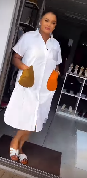 Women's white dress with colored pockets