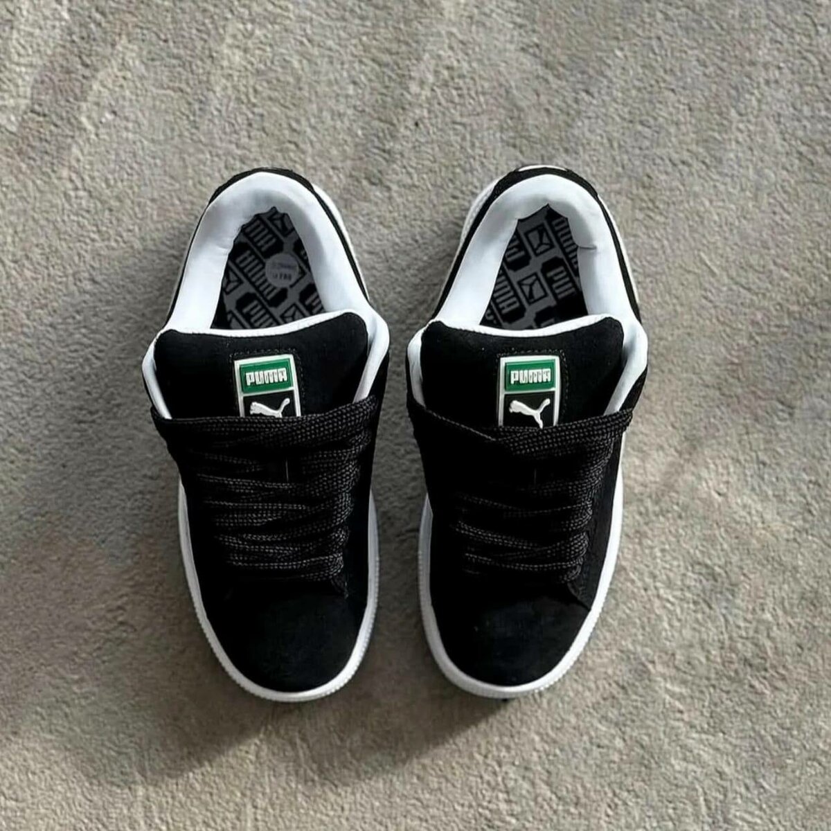 Baskets noires Puma élégantes