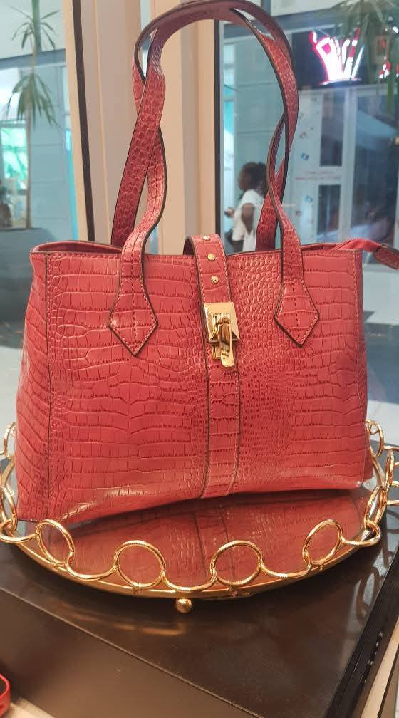 pink leather bag crocodile skin