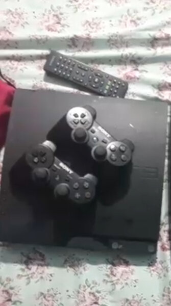 Console PS3 avec manettes