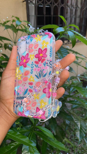 Coque fleurie avec bracelet