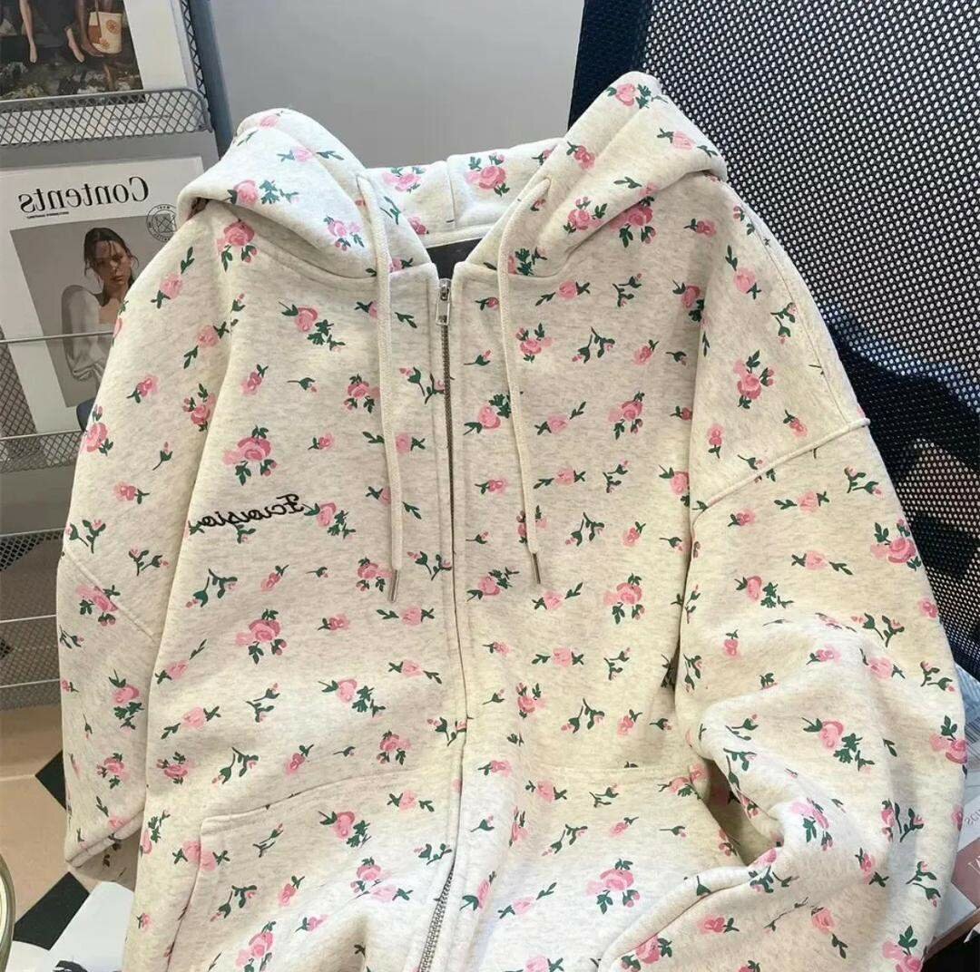 Veste à capuche fleurie