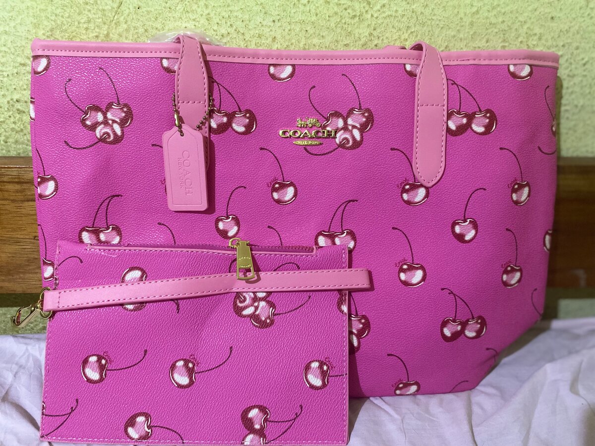 Coach cerise deux poche