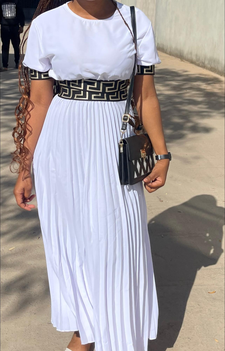 set white top and pleated skirt