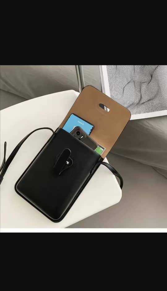 Sac bandoulière compact en cuir