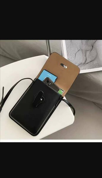 Sac bandoulière compact en cuir