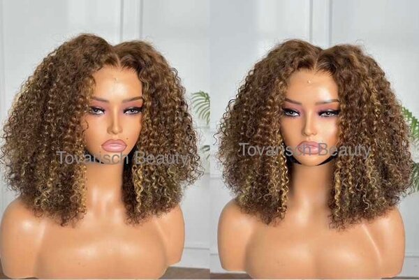 Charlotte - Curly with buttercream highlights.