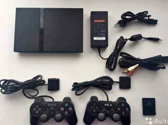 Console PlayStation 2 avec accessoires