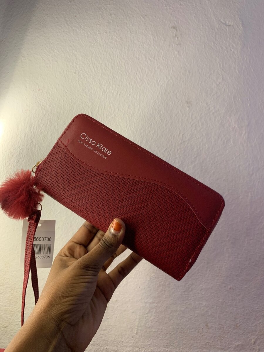 Portefeuille élégant avec pompon