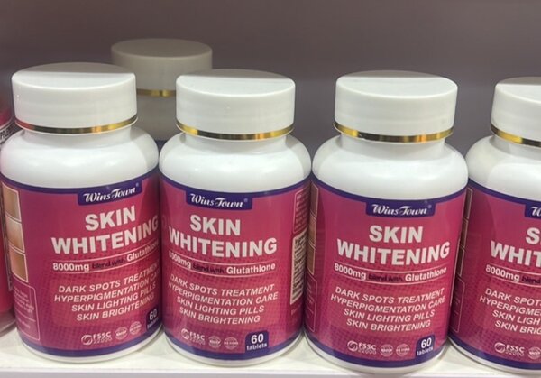 Skin whitening pills