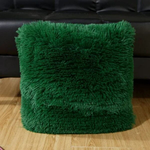 Coussin moelleux vert doux