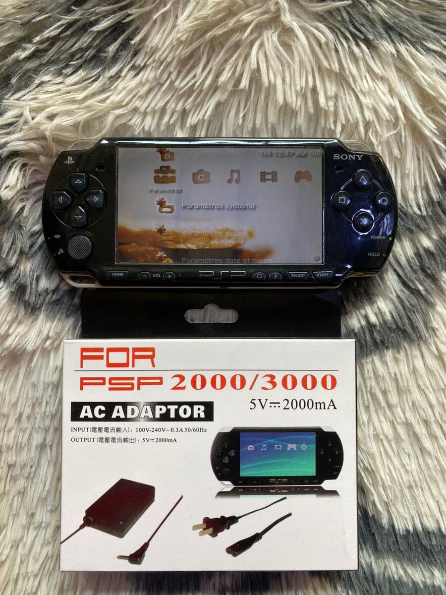 Console PSP 2000/3000 avec adaptateur