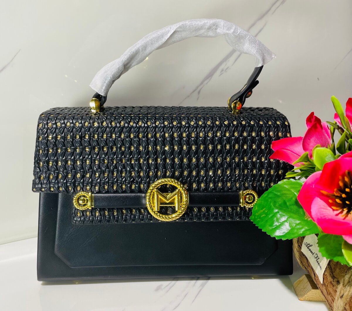 Sac à main élégant tressé